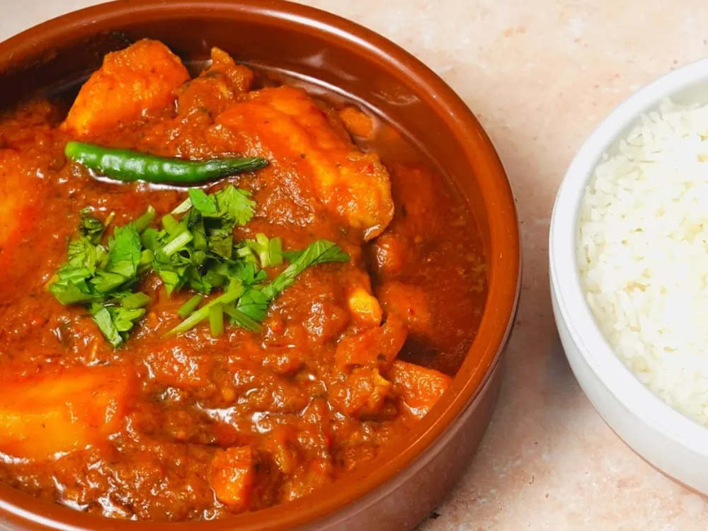 Curry Fish Vindaloo — Seafood Specials at Clifton Indian Restaurant and Bar, Cincinnati, OH